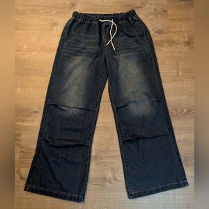 Woman's Dark Blue Elastic Waist Pull On Jeans With Very Wide Leg.
